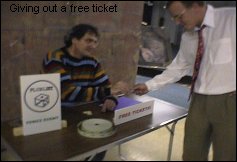 Allen Bukoff handing out free ticket